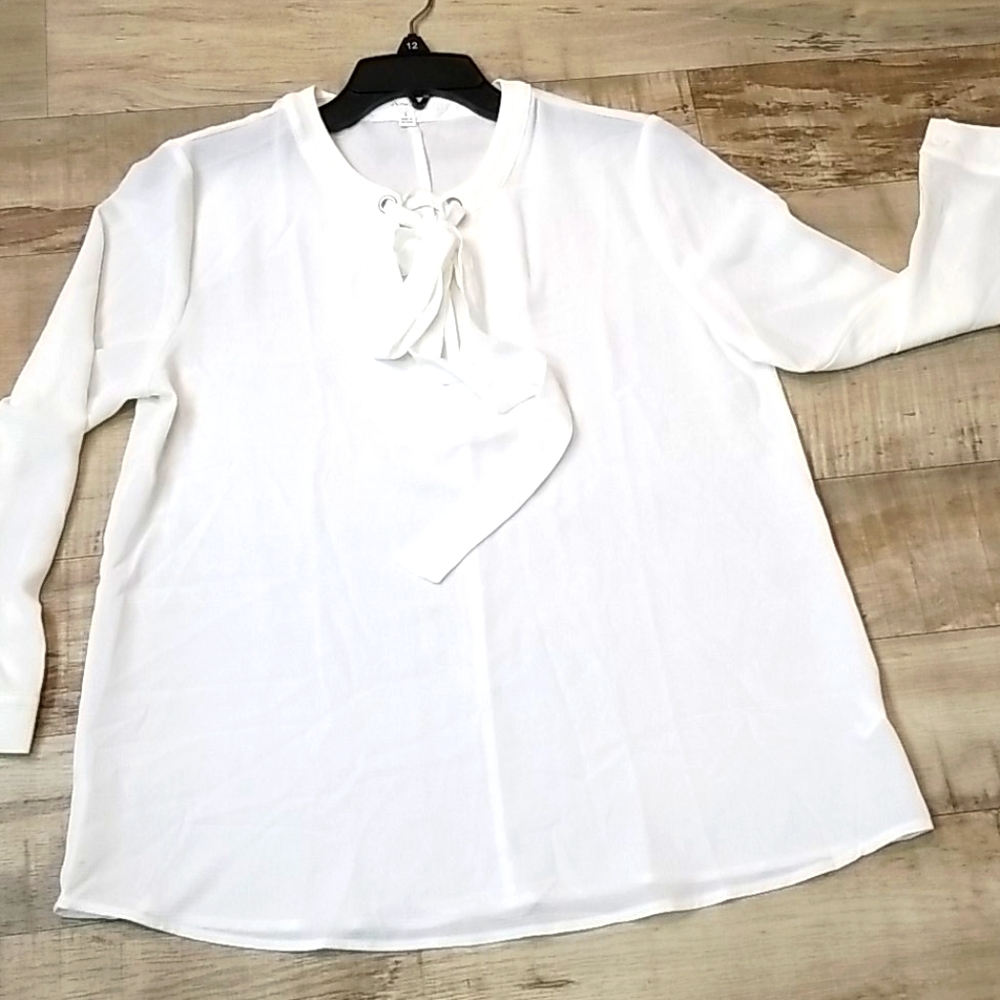 Cream colored blouse never worn